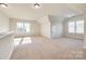 Bright bonus room with neutral carpet and multiple windows at 5734 Morris Hunt Dr, Fort Mill, SC 29708