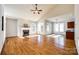 Sunlit great room with hardwood floors, fireplace and high ceilings at 5734 Morris Hunt Dr, Fort Mill, SC 29708