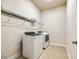 Laundry room with washer, dryer, and shelving at 5734 Morris Hunt Dr, Fort Mill, SC 29708