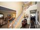 Elegant entryway with staircase, hardwood floors, and views into living areas at 625 Circle Trace Rd, Monroe, NC 28110