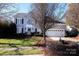 Two-story house with gray siding, attached garage, and landscaping at 625 Circle Trace Rd, Monroe, NC 28110