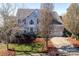 Two-story house with gray siding, attached garage, and landscaping at 625 Circle Trace Rd, Monroe, NC 28110