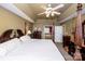 Spacious main bedroom with a king-size bed and access to bathroom at 625 Circle Trace Rd, Monroe, NC 28110