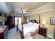 Main bedroom with a large four poster bed and ensuite bath at 625 Circle Trace Rd, Monroe, NC 28110