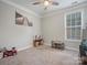 Bright bedroom with carpeted floor and ceiling fan at 9507 Inverness Bay Rd, Charlotte, NC 28278