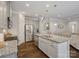 Modern kitchen island with granite countertop and stainless steel appliances at 9507 Inverness Bay Rd, Charlotte, NC 28278