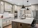 Well-lit kitchen with stainless steel appliances, granite countertops, and a large island at 111 Alberta Ave, Belmont, NC 28012