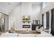 Bright living room features a modern fireplace with a TV above, perfect for cozy evenings at 111 Alberta Ave, Belmont, NC 28012