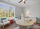Inviting home office space with natural light, stylish furniture, and a calming atmosphere at 111 Alberta Ave, Belmont, NC 28012