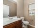 Small bathroom with single sink vanity and toilet at 119 Lookout Point Pl, Mooresville, NC 28115