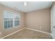 Simple bedroom with carpeted floor, window blinds, and neutral wall paint at 119 Lookout Point Pl, Mooresville, NC 28115