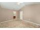 Bright bedroom featuring carpeted floors and ceiling fan at 119 Lookout Point Pl, Mooresville, NC 28115