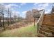 Wooden deck with stairs leading to backyard at 119 Lookout Point Pl, Mooresville, NC 28115