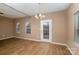 Spacious dining area with hardwood floors and neutral walls at 119 Lookout Point Pl, Mooresville, NC 28115