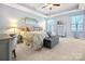 Relaxing main bedroom with carpeted floors and ample natural light at 1969 Tablerock Dr, Lake Wylie, SC 29745