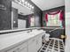 Bathroom featuring dark walls and a large vanity with built-in sink at 2319 Tin Mine Rd, Lincolnton, NC 28092