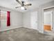 Spacious bedroom with neutral carpet and ceiling fan at 2319 Tin Mine Rd, Lincolnton, NC 28092