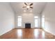 Spacious living room with hardwood floors, fireplace, and vaulted ceiling at 2509 Lower Assembly Ln # 10, Fort Mill, SC 29708