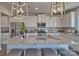 Modern kitchen featuring a large island with seating and stainless steel appliances at 320 Coronado Ave, Matthews, NC 28104
