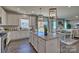 Bright kitchen with an island, modern appliances, and a seamless transition to the dining area at 320 Coronado Ave, Matthews, NC 28104