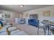 Inviting living room with comfortable seating, a TV, and a round table for dining at 320 Coronado Ave, Matthews, NC 28104