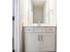 Small bathroom with white vanity and a large mirror at 4113 Black Ct # 167, Harrisburg, NC 28075