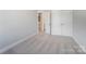 Simple bedroom with double doors and neutral wall colors at 4113 Black Ct # 167, Harrisburg, NC 28075