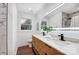 Bathroom with double vanity and marble shower at 6405 Mill Grove Rd, Indian Trail, NC 28079