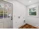 Laundry room with window and wood flooring at 6405 Mill Grove Rd, Indian Trail, NC 28079