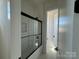 Bathroom features sliding glass shower doors with black hardware at 7392 Deer Hollow Rd # 27, Sherrills Ford, NC 28673