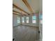 Spacious bedroom with beautiful wood beams, large windows offering natural light at 7392 Deer Hollow Rd # 27, Sherrills Ford, NC 28673