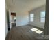 Bedroom features hard wood floors and plenty of natural light from the multiple windows at 7392 Deer Hollow Rd # 27, Sherrills Ford, NC 28673