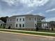 Elegant home exterior showcasing a combination of siding, windows, covered porch, and landscaping at 7392 Deer Hollow Rd # 27, Sherrills Ford, NC 28673