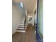 Entryway hallway with hardwood floors and staircase leading to upper level at 7392 Deer Hollow Rd # 27, Sherrills Ford, NC 28673