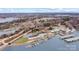 Aerial view of waterfront condos with boat slips and parking showcasing the lake access at 7831 Spinnaker Bay Dr # 314, Sherrills Ford, NC 28673