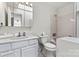 Bathroom featuring a vanity, toilet, shower, and medicine cabinet above the toilet at 7831 Spinnaker Bay Dr # 314, Sherrills Ford, NC 28673