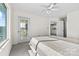 Bright bedroom with a balcony door, neutral walls, and sunlight filling the space at 7831 Spinnaker Bay Dr # 314, Sherrills Ford, NC 28673