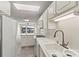 Bright kitchen boasts ample counter space, modern appliances, and serene water views at 7831 Spinnaker Bay Dr # 314, Sherrills Ford, NC 28673
