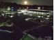Night view of a serene marina with boats, docks, and a softly illuminated full moon reflecting on the water at 7831 Spinnaker Bay Dr # 314, Sherrills Ford, NC 28673