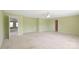 Spacious bedroom with neutral carpet, fresh paint, and view to connecting room at 1114 Fenwick Ct, Clover, SC 29710