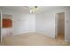 Bright bedroom with carpet and neutral walls leading to a closet at 1114 Fenwick Ct, Clover, SC 29710
