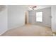 Bright bedroom with carpet and neutral walls and ample shelving and closet at 1114 Fenwick Ct, Clover, SC 29710