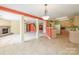 Open-concept living area with tile flooring, seamless transitions between living spaces, perfect for modern Gathering living and entertaining at 1114 Fenwick Ct, Clover, SC 29710
