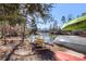 Kayaks on rack near the lake. Enjoy water recreation at 16042 River Tree Ln, Charlotte, NC 28278