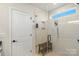 Walk-in shower with glass enclosure, built-in shelving, and bench at 16042 River Tree Ln, Charlotte, NC 28278