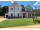 Beautifully designed new construction home with a well-manicured lawn and inviting curb appeal at 2007 Kendall Dr # 6, Wesley Chapel, NC 28173