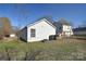 The backyard has a play area, a fenced-in yard, and grass at 3076 Champion Sw Ln, Concord, NC 28025