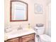 Bright bathroom featuring a vanity with a sink, a commode, and shower with curtain at 3076 Champion Sw Ln, Concord, NC 28025