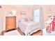 Charming bedroom with a full-sized bed, wood floors, and decorative accents at 3076 Champion Sw Ln, Concord, NC 28025