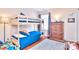 Nice bedroom showcasing a bunk bed, wood floors, and neutral-colored walls at 3076 Champion Sw Ln, Concord, NC 28025